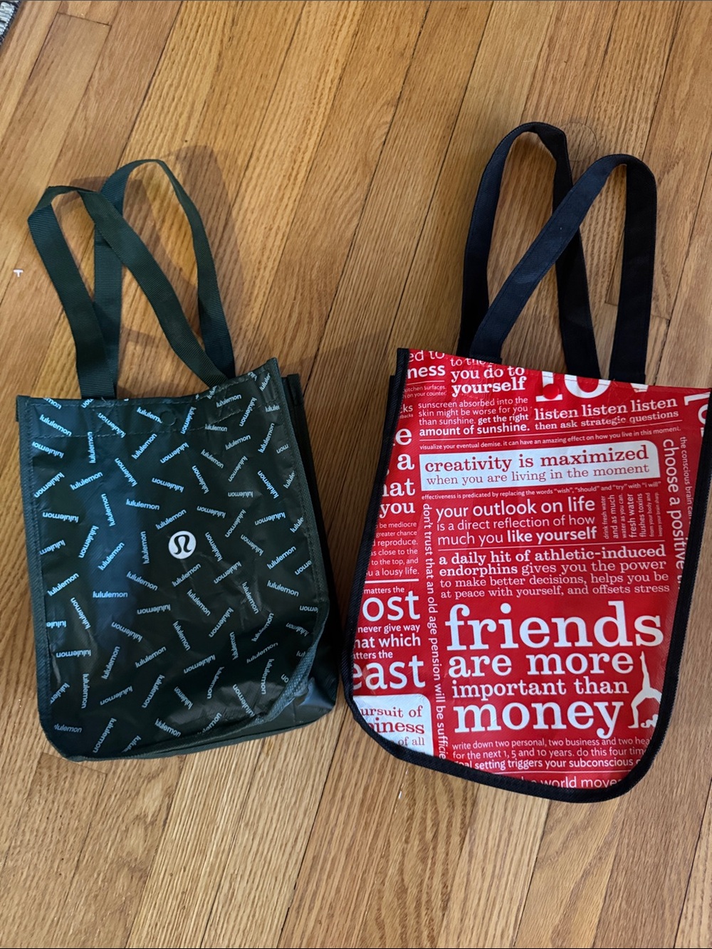 Two Lululemon shopping bags